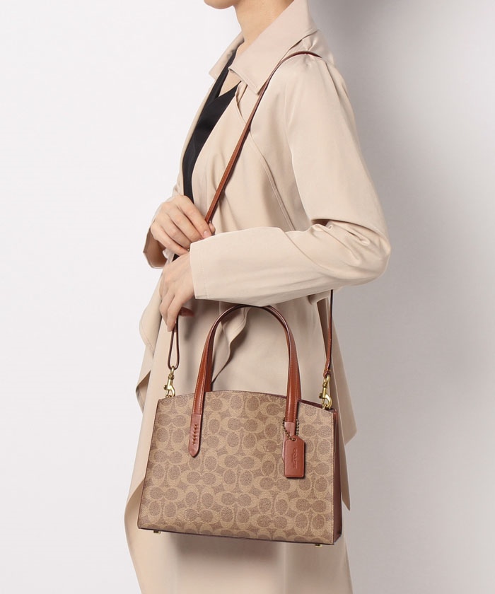 Coach charlie carryall snakeskin hotsell