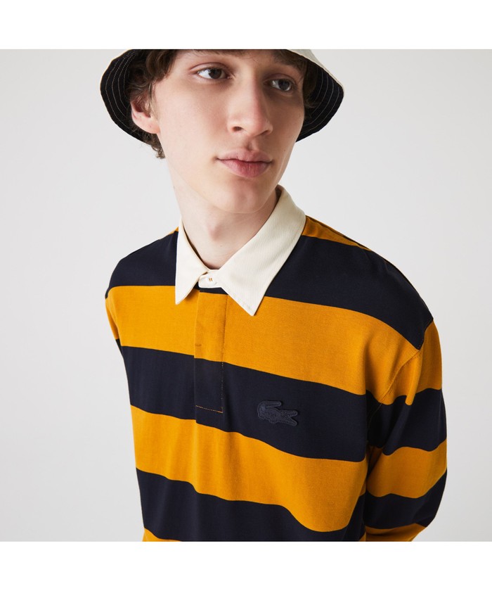 ラコステ LACOSTE パネルボーダーヘリテージグラフィックラガー
