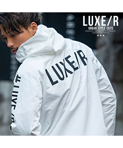 Luxe R ロゴプリント入りジップアップ長袖マウンテンパーカー メンズ ブランド プリント ロゴ ブラック ホワイト 黒 白 蛍光色 ラグジュアリースポーツ エスビーセレクト Sb Select D Fashion