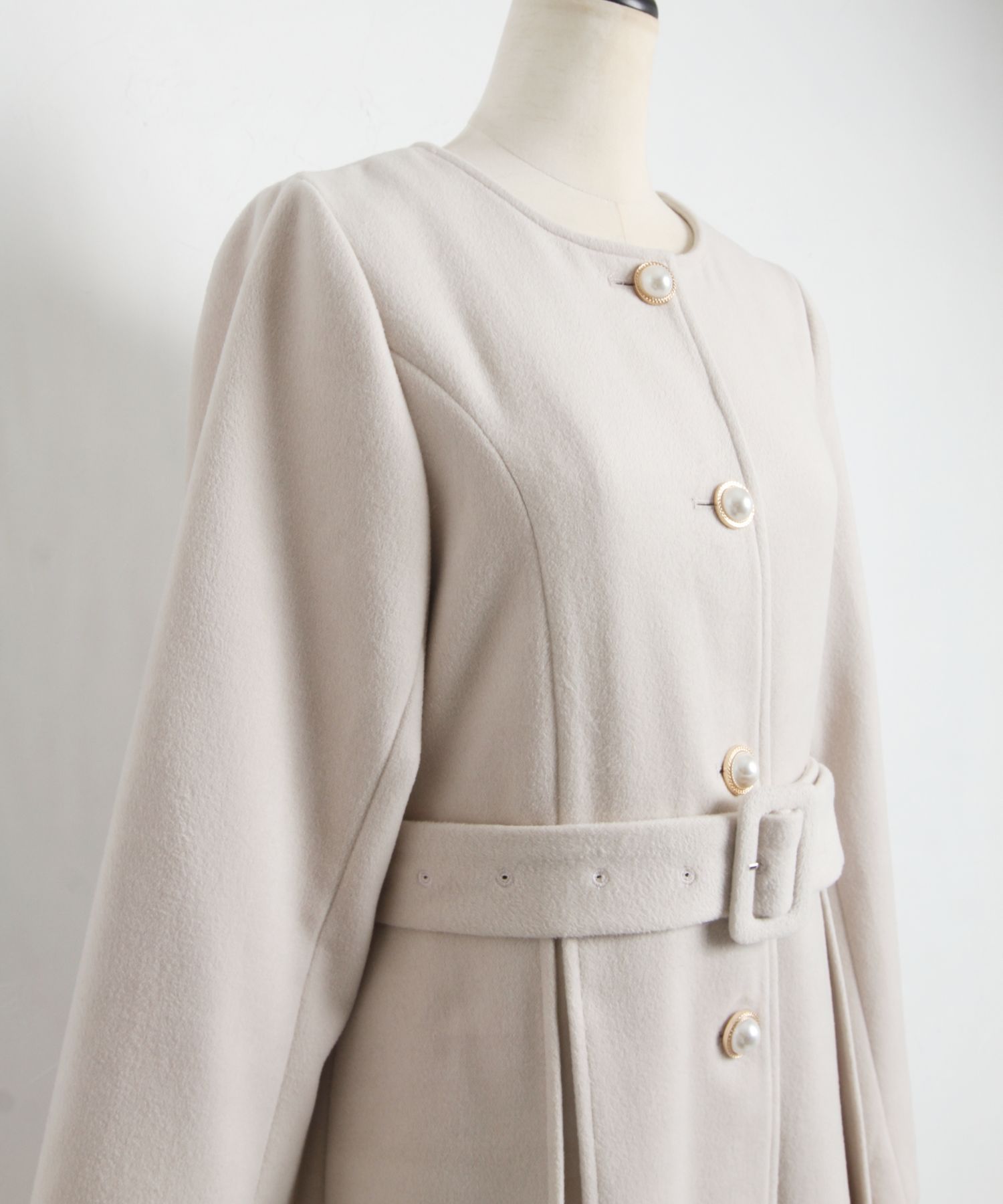 tocco closet（トッコ クローゼット）の「ベルト付きパール釦
