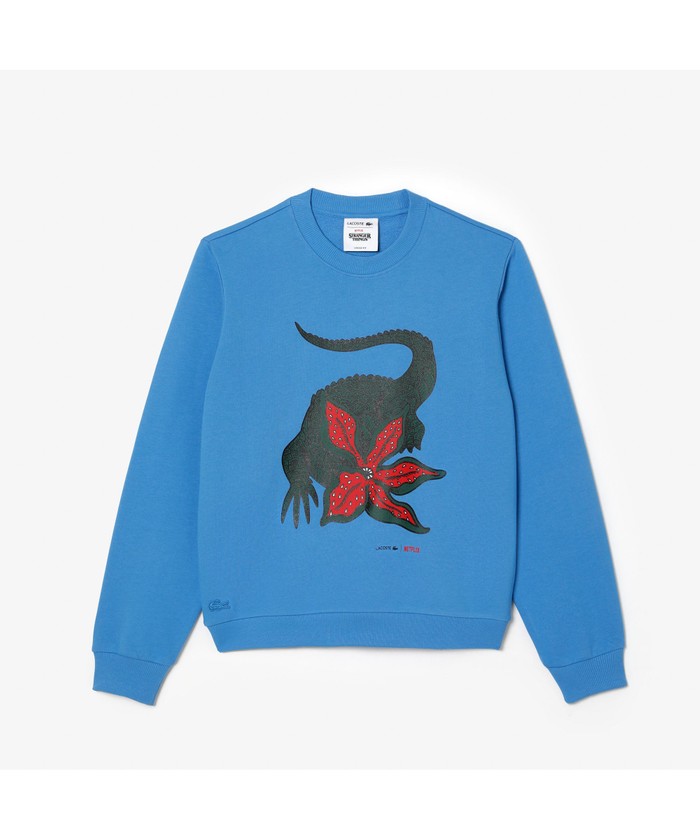 LACOSTE×NETFLIX総柄トラックパンツ ワニコラボロゴ新品 総柄転写プリントトラックパンツ XH0141 - ラコステ（LACOSTE