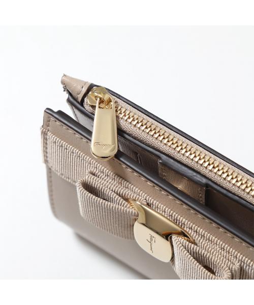 セール 23%OFF】SALVATORE FERRAGAMO 二つ折り財布 22E009