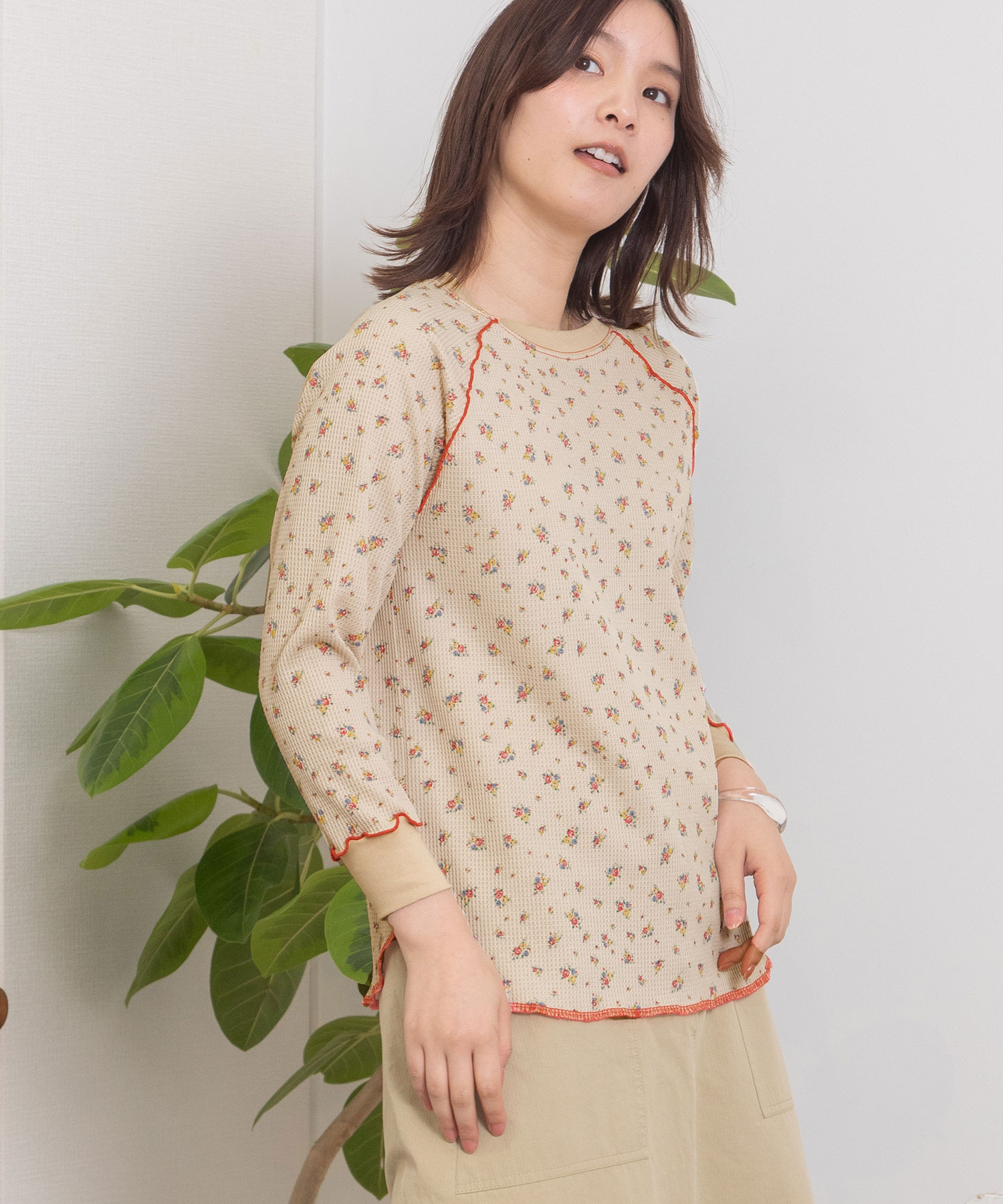 TSURU フラワープリント ペプラムトップス TSURU フラワープリント ペプラムトップス