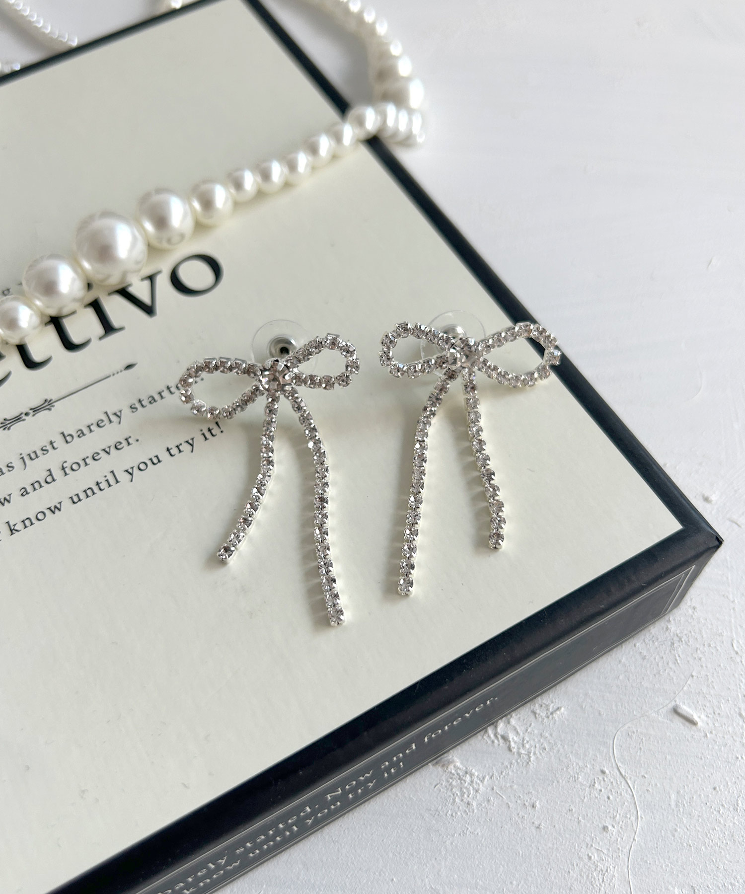 ピアス リボン ロング シルバー 揺れる キラキラブライダル 韓国12set 即納】[925 Silver]ロングテール ライン リボン ピアス 韓国