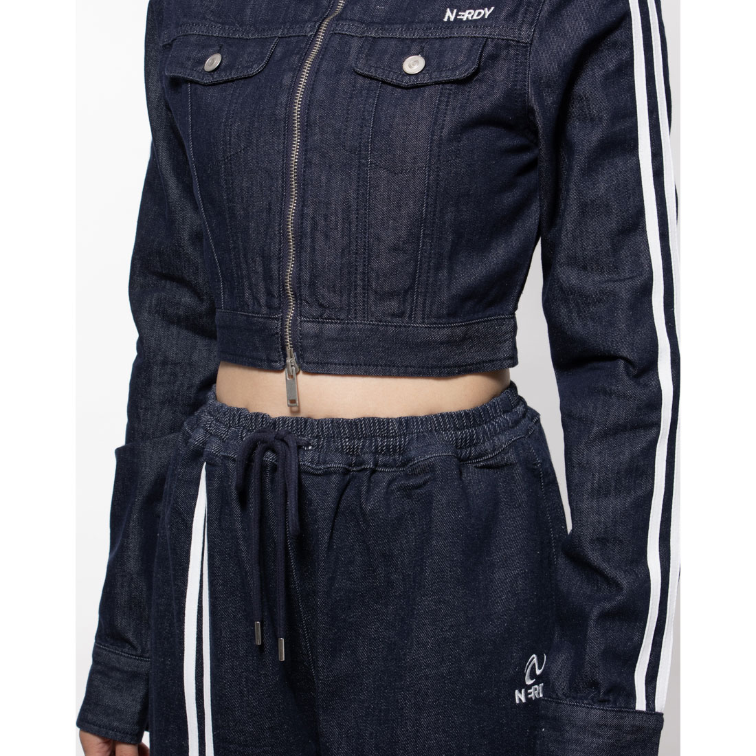 NERDY デニムトラッカートラックトップス  M セール】ノルディ NERDY DENIM CROPPED TRUCKER TRACK TOP