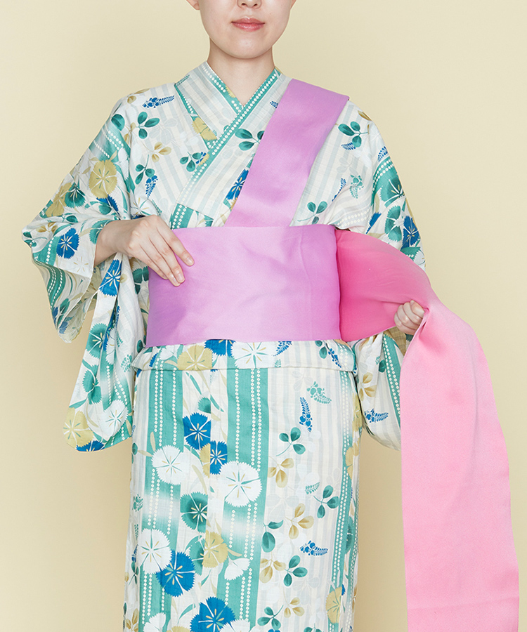 6. 帯をもう一巻きする