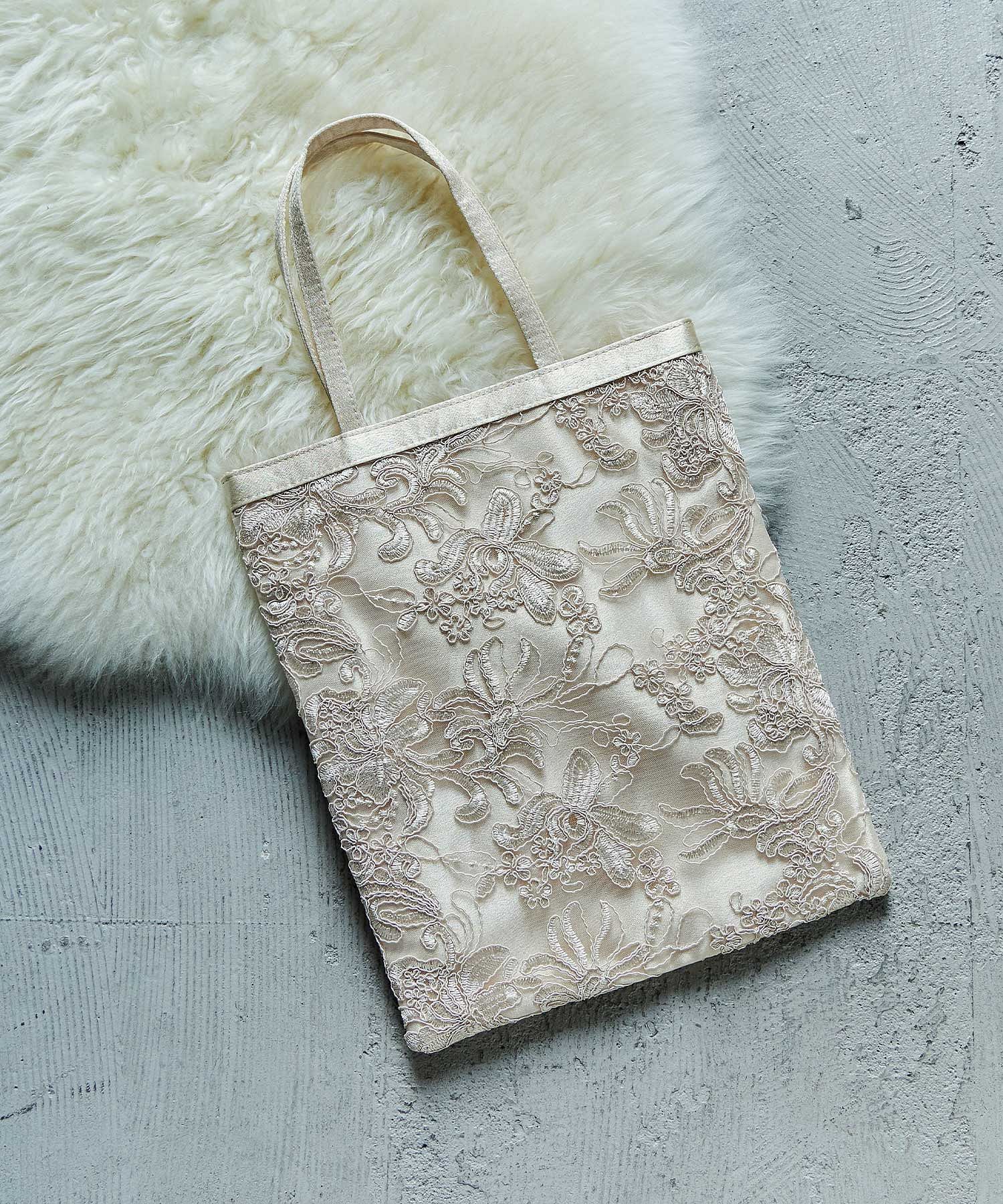 ラリマール　レースアップ　ベージュ　niana ニアナ 刺繍　バックリボン ニアナ niana 刺しゅうレース バックリボン タイトドレス